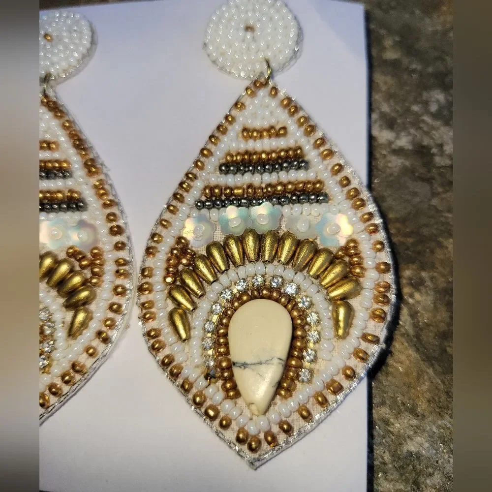 White Seed Beaded Fish Eyed Earrings in Goldtone